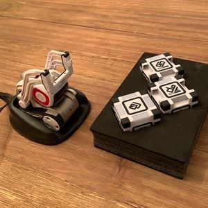 Anki Cozmo robot with three cubes and charger